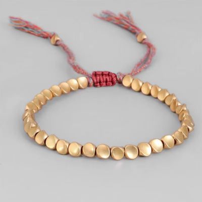 Bracelet-tibétain-pierre-obsidienne-dorée